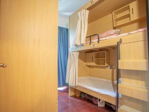 Voodi või voodid majutusasutuse Yiweidu Youth Apartment toas