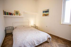 Ein Bett oder Betten in einem Zimmer der Unterkunft Anchi Guesthouse