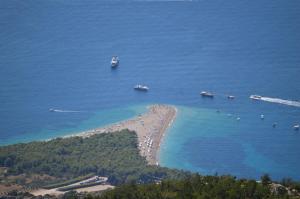 an aerial view of a beach with boats in the water at Apartmani Marijana in Bol