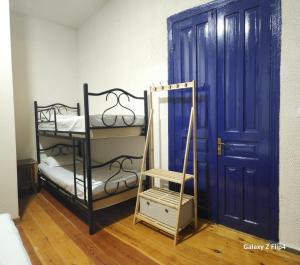 Postel nebo postele na pokoji v ubytování Iveri House
