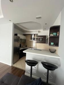 Kuchyň nebo kuchyňský kout v ubytování Apartament Jana Pawła