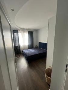 Postel nebo postele na pokoji v ubytování Apartament Jana Pawła