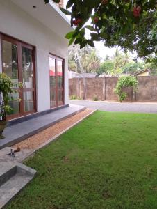 Zahrada ubytování Crush River Villa Hikkaduwa + 20 fotografií