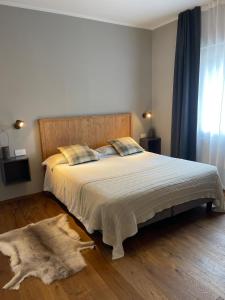 Postel nebo postele na pokoji v ubytování Condhotel Fanti
