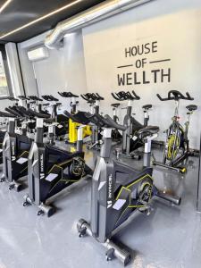a gym with a row of treadmills and bikes at Apartment in Jounieh - J707 in Al Bāţiyah