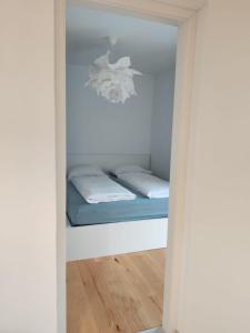 Postel nebo postele na pokoji v ubytování Mint Apartment