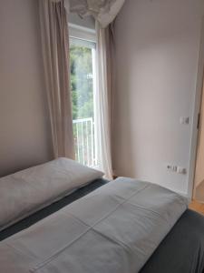 Postel nebo postele na pokoji v ubytování Mint Apartment