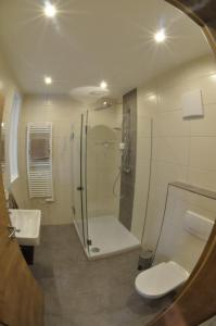 Ванная комната в Hotel - Garni Mittelpunkt-Europa GmbH