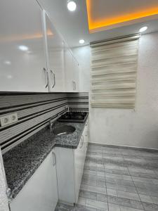 Kuchyň nebo kuchyňský kout v ubytování Sultanahmet Immortelle Apartment
