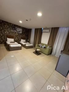 Ένα μπάνιο στο Al-RAYAN HOTEL SUITES