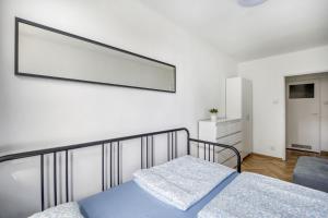 Posteľ alebo postele v izbe v ubytovaní Śliska Residence