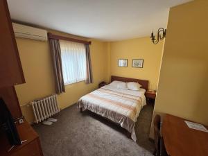 Postel nebo postele na pokoji v ubytování Ada Apartments + 37 fotografií