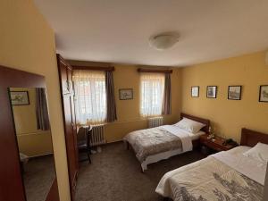 Postel nebo postele na pokoji v ubytování Ada Apartments