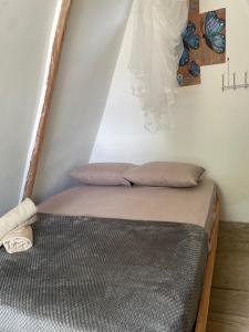Postel nebo postele na pokoji v ubytování Cascada escondida glamping