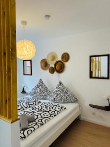 Katil atau katil-katil dalam bilik di Casa del Mar - Ferienwohnung Norddeich