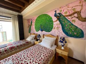 Postel nebo postele na pokoji v ubytování Basilic Boutique Hotel
