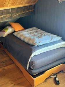 two beds are stacked on top of each other at Appartement au cœur des montagnes in Métabief +7 photos