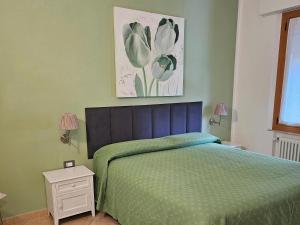 Postel nebo postele na pokoji v ubytování Guest house Il Giardino in Città