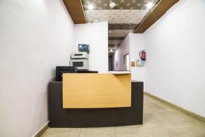 TV a/nebo společenská místnost v ubytování Hotel O Iris Lite