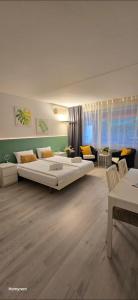 Postel nebo postele na pokoji v ubytování Residenza Lago di Lugano