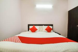 Postel nebo postele na pokoji v ubytování Hotel O Iris Lite