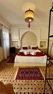 Postel nebo postele na pokoji v ubytování Riad Magnolia&SPA