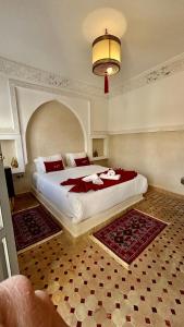 Postel nebo postele na pokoji v ubytování Riad Magnolia&SPA