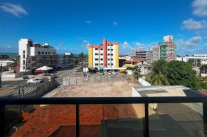 a view of a city from a balcony at Duplex Super Charmoso 200m Praia Bessa 3 Pessoas in Nossa Senhora do Livramento