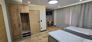 KaMi Self check-in 24 h客房内的一张或多张床位