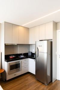 Køkken eller tekøkken på Studio PRIME CUIABÁ