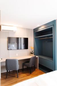 Et tv og/eller underholdning på Studio PRIME CUIABÁ