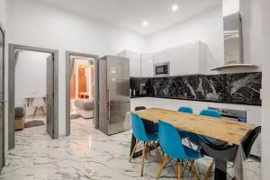 Kuchyňa alebo kuchynka v ubytovaní Apartamento en Planta Baja Cerca de la Playa en Badalona