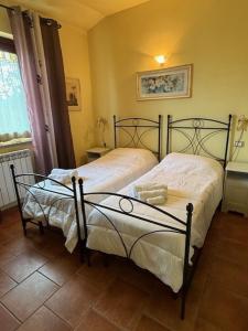 Postel nebo postele na pokoji v ubytování Dimora della Jana