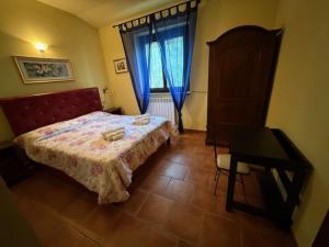 Postel nebo postele na pokoji v ubytování Dimora della Jana