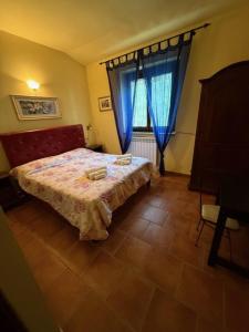 Postel nebo postele na pokoji v ubytování Dimora della Jana