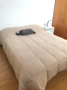 Katil atau katil-katil dalam bilik di Hogar