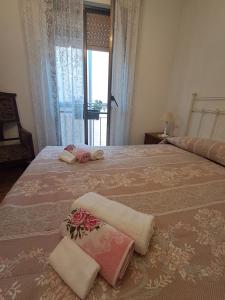 Postel nebo postele na pokoji v ubytování ALBERGUE CASA ARQUEÑA sólo peregrinos con credenciales