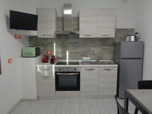 Nhà bếp/bếp nhỏ tại Appartamenti C&M Al Cortile vicino Venezia e Aeroporto VCE