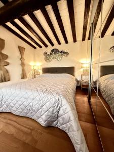 Ένα ή περισσότερα κρεβάτια σε δωμάτιο στο Vista - Vivi la storia in prima fila