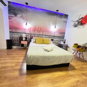 En eller flere senge i et værelse på Habitación loft centro