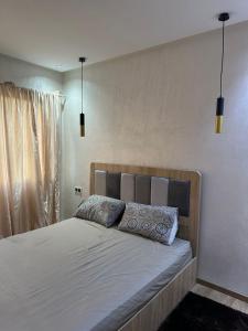 Postel nebo postele na pokoji v ubytování McDonalds Apartment 2 Mars