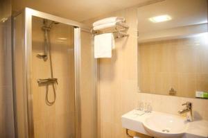 a bathroom with a shower and a sink at Hostal Rocamar in Santander +34 photos