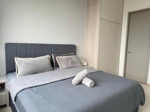 Postel nebo postele na pokoji v ubytování Iconic Regency Service Residences - Xin's Home + 76 fotografií