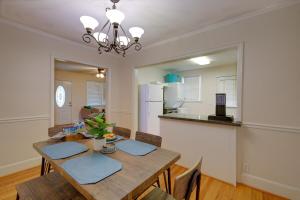 a dining room and kitchen with a table and chairs at 2 Bed Charming Home Cayce W Columbia in Cayce