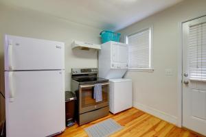 a kitchen with a refrigerator and a stove at 2 Bed Charming Home Cayce W Columbia in Cayce +17 photos