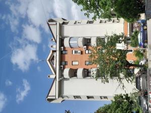 an apartment building with balconies on the side of it at HARMONY in Žarkovo