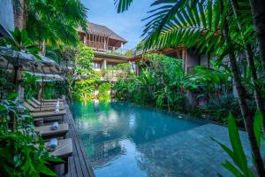 Bazén v ubytování Purana Suite Ubud nebo v jeho okolí