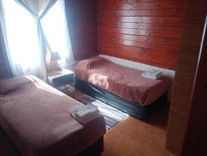 Postel nebo postele na pokoji v ubytování Aladino cabañas