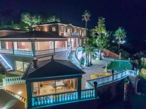 an aerial view of a mansion at night at Villa de Maître 6 Chambres avec Piscine et Jacuzzi - FR-1-768-119 in Roquebrune-sur-Argens