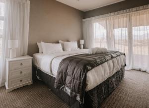 Ένα ή περισσότερα κρεβάτια σε δωμάτιο στο Mountain View Retreat